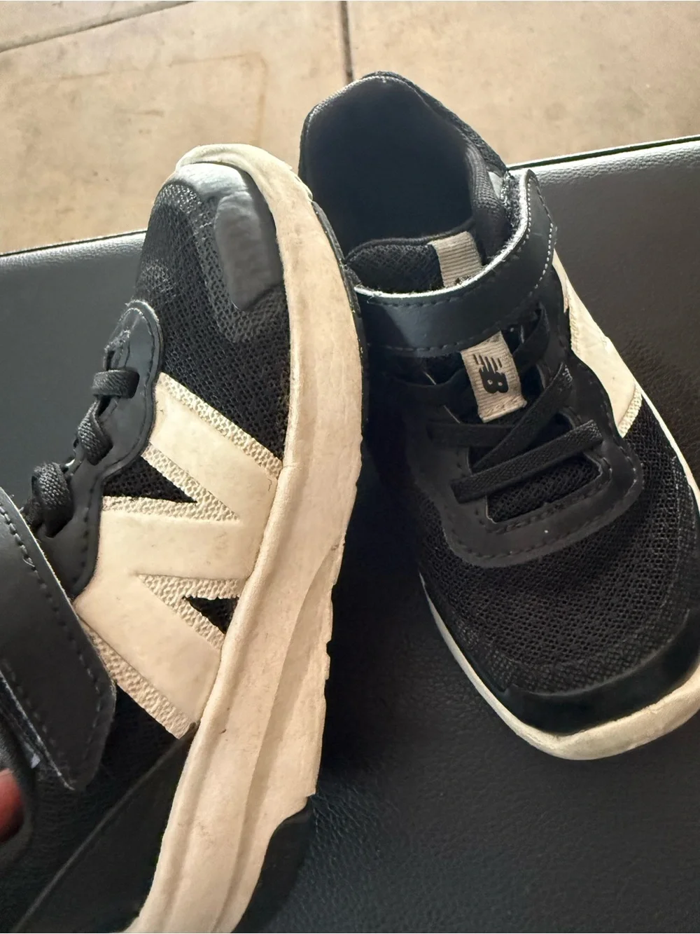 New Balance Kids Black and White Velcro Sneakers